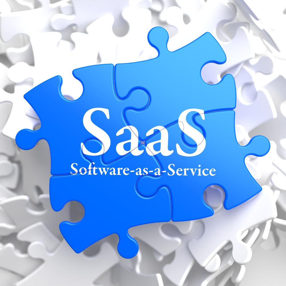 SAAS - Software-as-a-Service - Written on Blue Puzzle Pieces. Information Technology Concept. 3D Render..jpeg