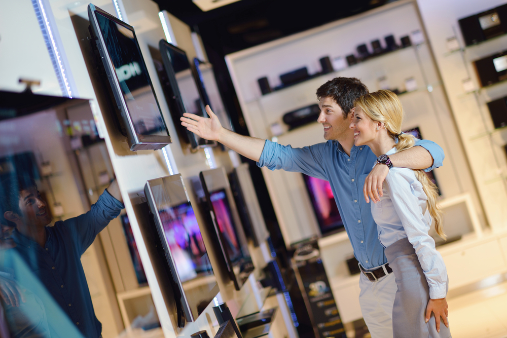 people in consumer electronics store